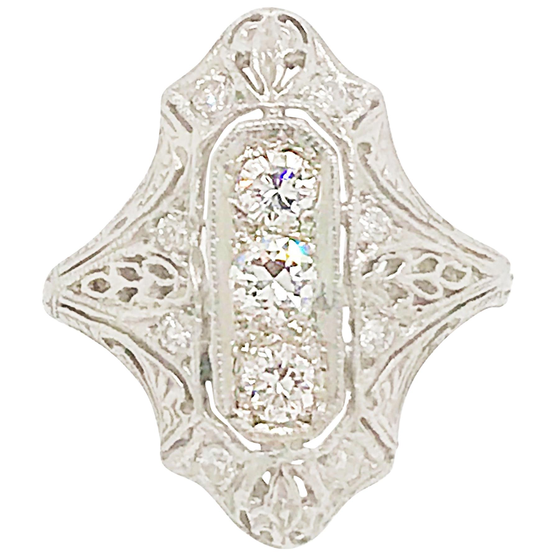 Platinum Antique Style Diamond Ring with Pierced Filigree Detailing