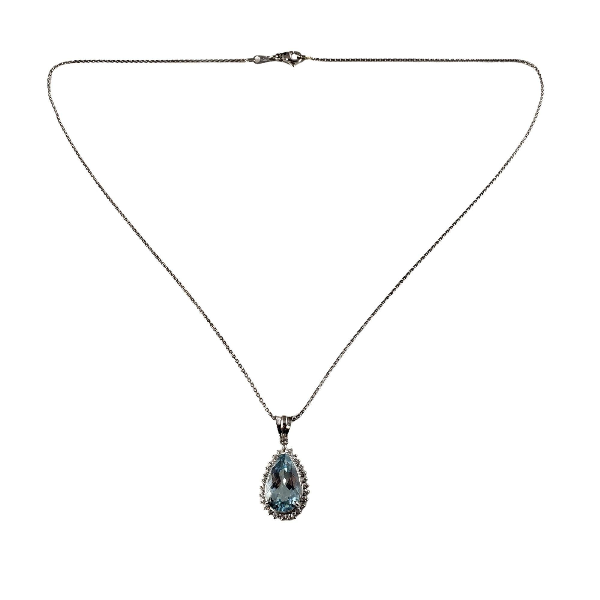 Vintage 18 Karat White Gold Aquamarine and Diamond Pendant Necklace JAGi Certified-

This stunning necklace features one pear shaped cut aquamarine (16 mm x 9 mm) and 27 round brilliant cut diamonds set in classic platinum. Suspends from an elegant