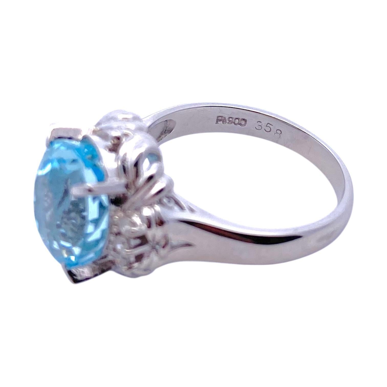 Oval Cut Platinum Aquamarine and Diamond Ring For Sale