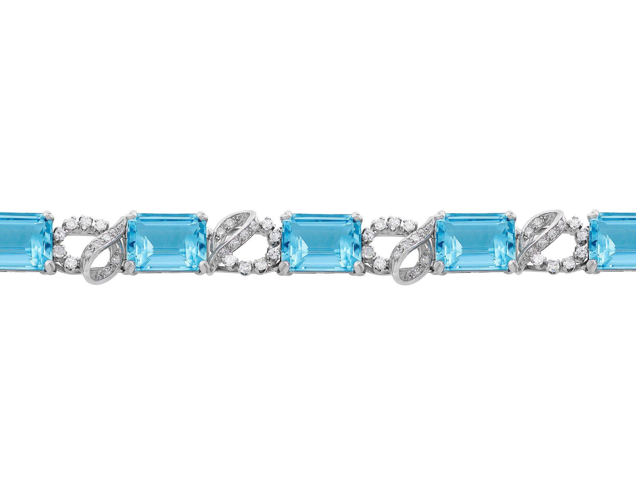 Estate platinum aquamarine and diamond bracelet circa late 1950's. Diamonds approximately 2.10ctw and aquamarines 40.85ctw.