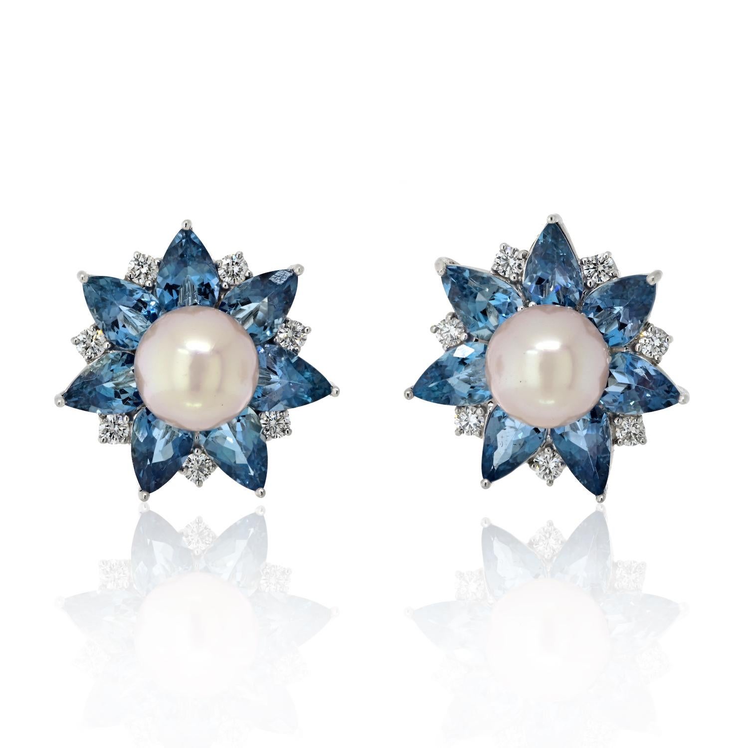 Adorn yourself with the enchanting allure of these Aquamarine, cultured pearl, and diamond earrings, a breathtaking masterpiece of elegance and sophistication. 

Crafted in lustrous platinum, these earrings feature a captivating design that