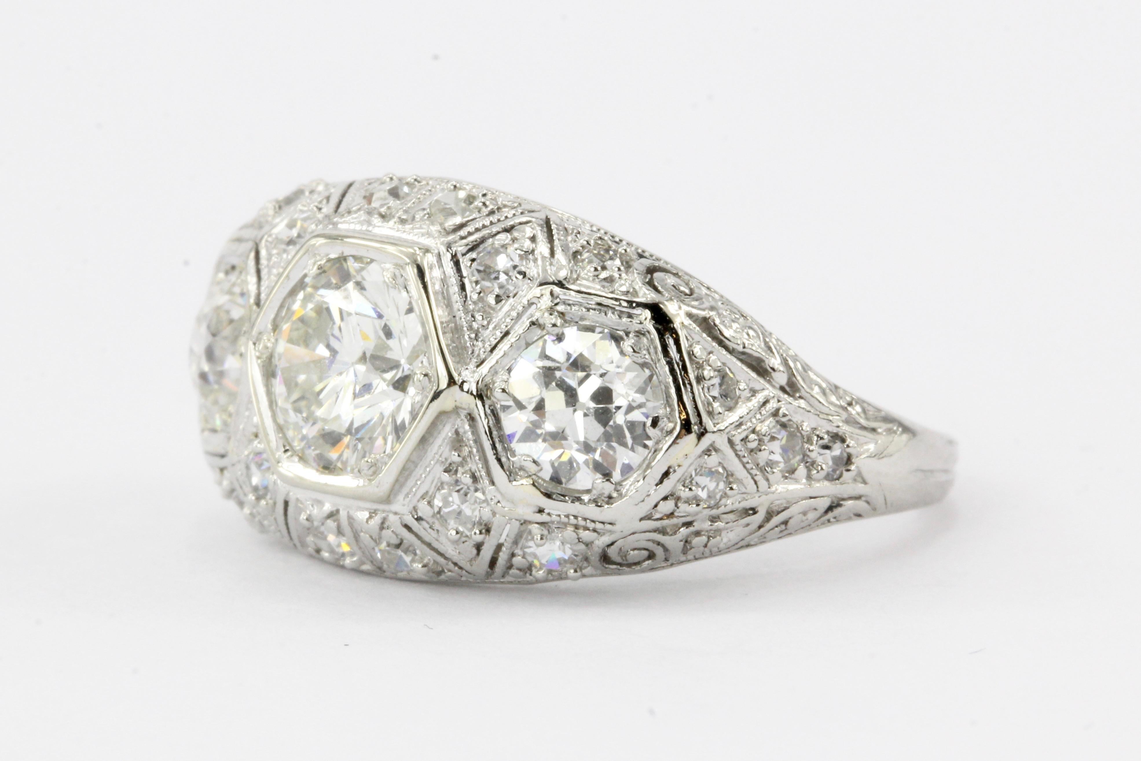 Era: Art Deco c. 1930’s

Hallmarks: IRID

Composition: Platinum

Primary Stone: Diamond (Old European Cut)

Stone Carat: Approximately 1 carat

Color / Clarity: I / VS2

Shape: Round

Accent Stone: Diamonds 

Color/Clarity: G/H - VS1/2

Third