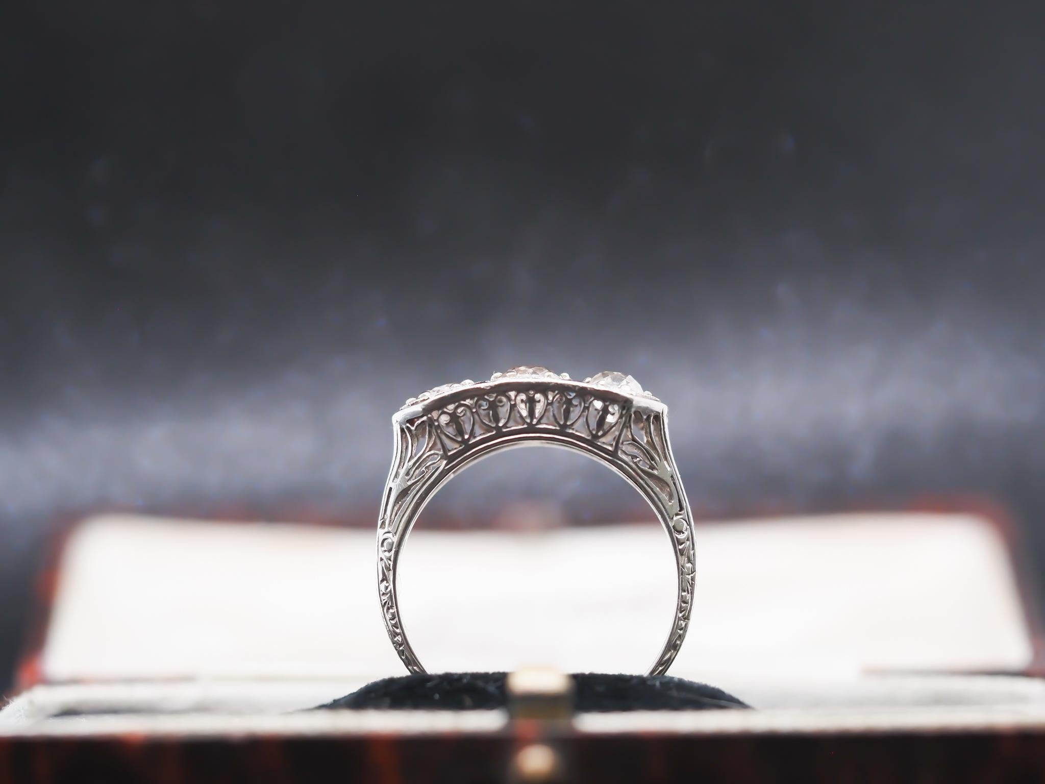 Platinum Art Deco 1920s Three Stone Ring with Sapphire Accents For Sale 1