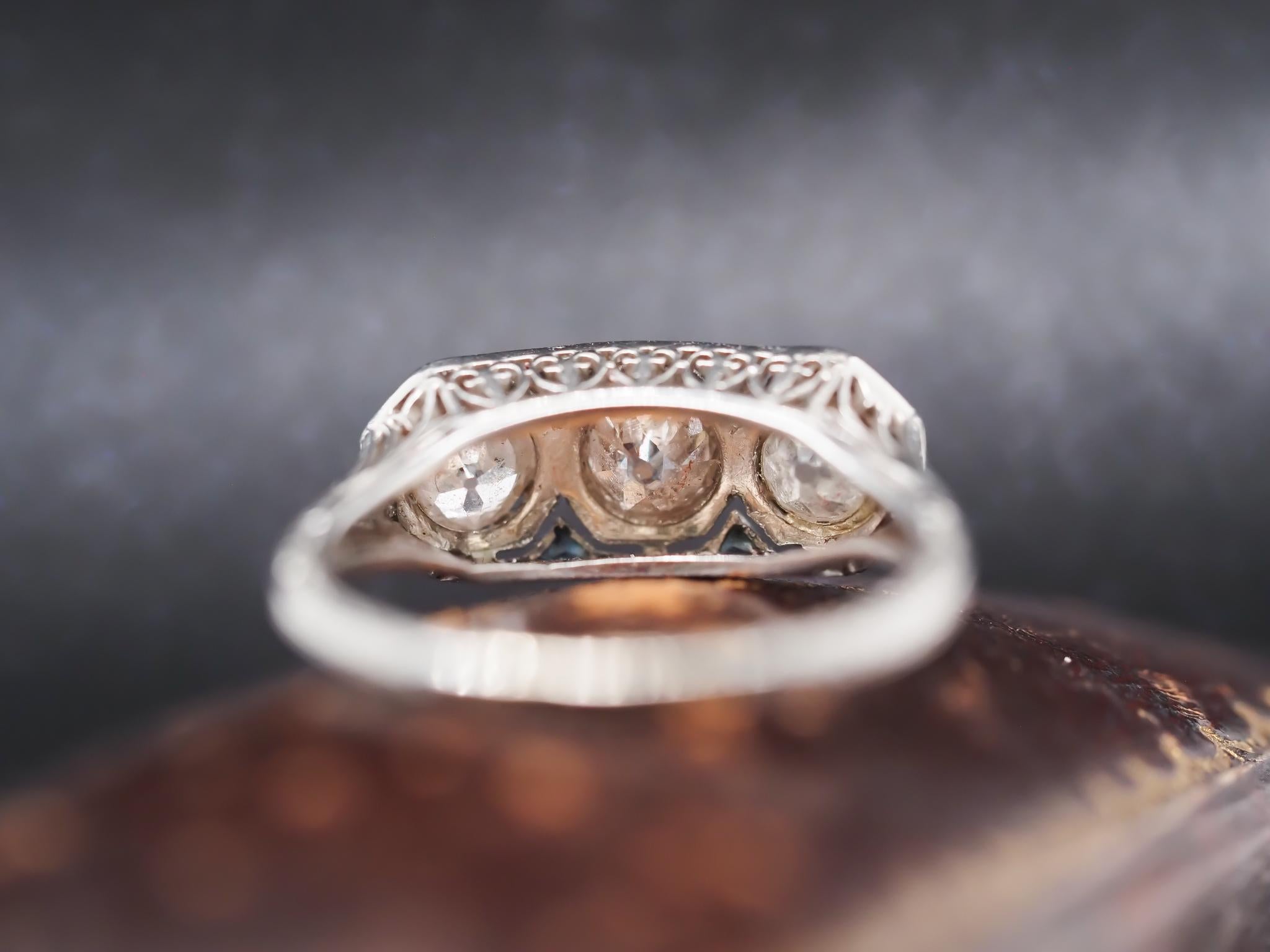 Platinum Art Deco 1920s Three Stone Ring with Sapphire Accents For Sale 2