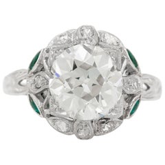 Platinum Art Deco 2.50 Center Diamond with Diamond around and Emerald