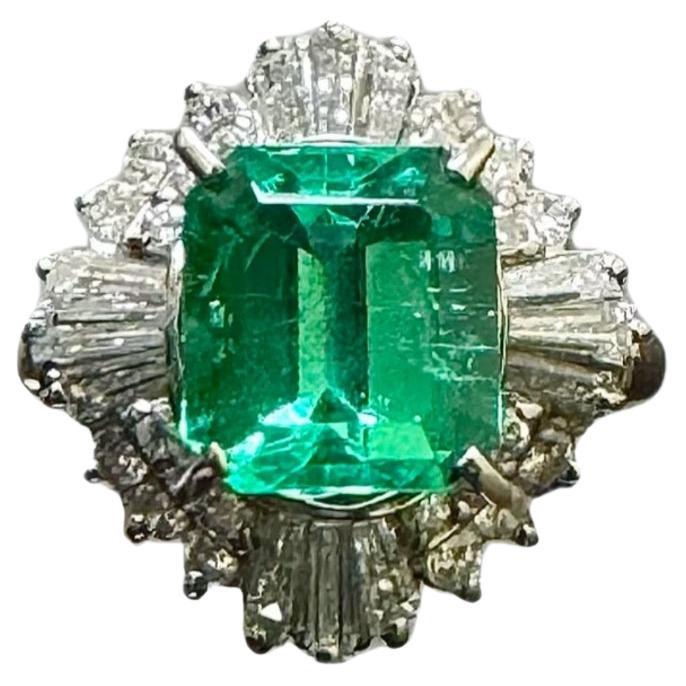 Platinum Art Deco Baguette Diamond 2.58 Carat Colombian Emerald Engagement Ring For Sale
