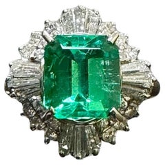Used Platinum Art Deco Baguette Diamond 2.58 Carat Colombian Emerald Engagement Ring