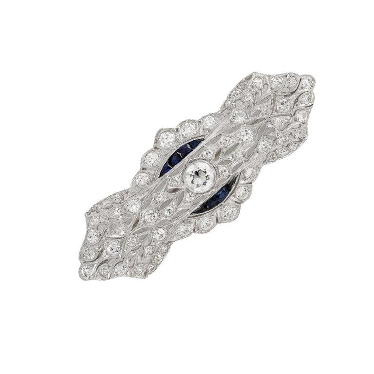 Round Cut Platinum Art Deco Brooch 2.50ct Diamonds Calibre-Cut Sapphires, circa 1925 For Sale