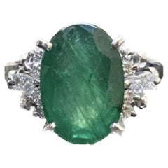 Used Platinum Art Deco Diamond 4.56 Carat Oval Emerald Engagement Ring
