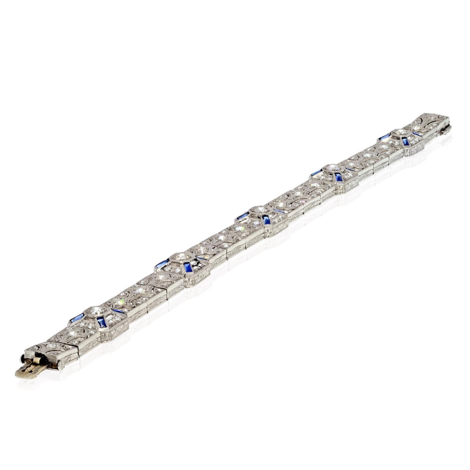 4 carats in diamonds decorate this beautiful Art Deco diamond and sapphire bracelet. Crafted in Platinum. Set with old cut diamonds and baguette cut sapphires. 
Lovely item that will be your favorite bracelet for many years to come. L: 6.75 inches.
