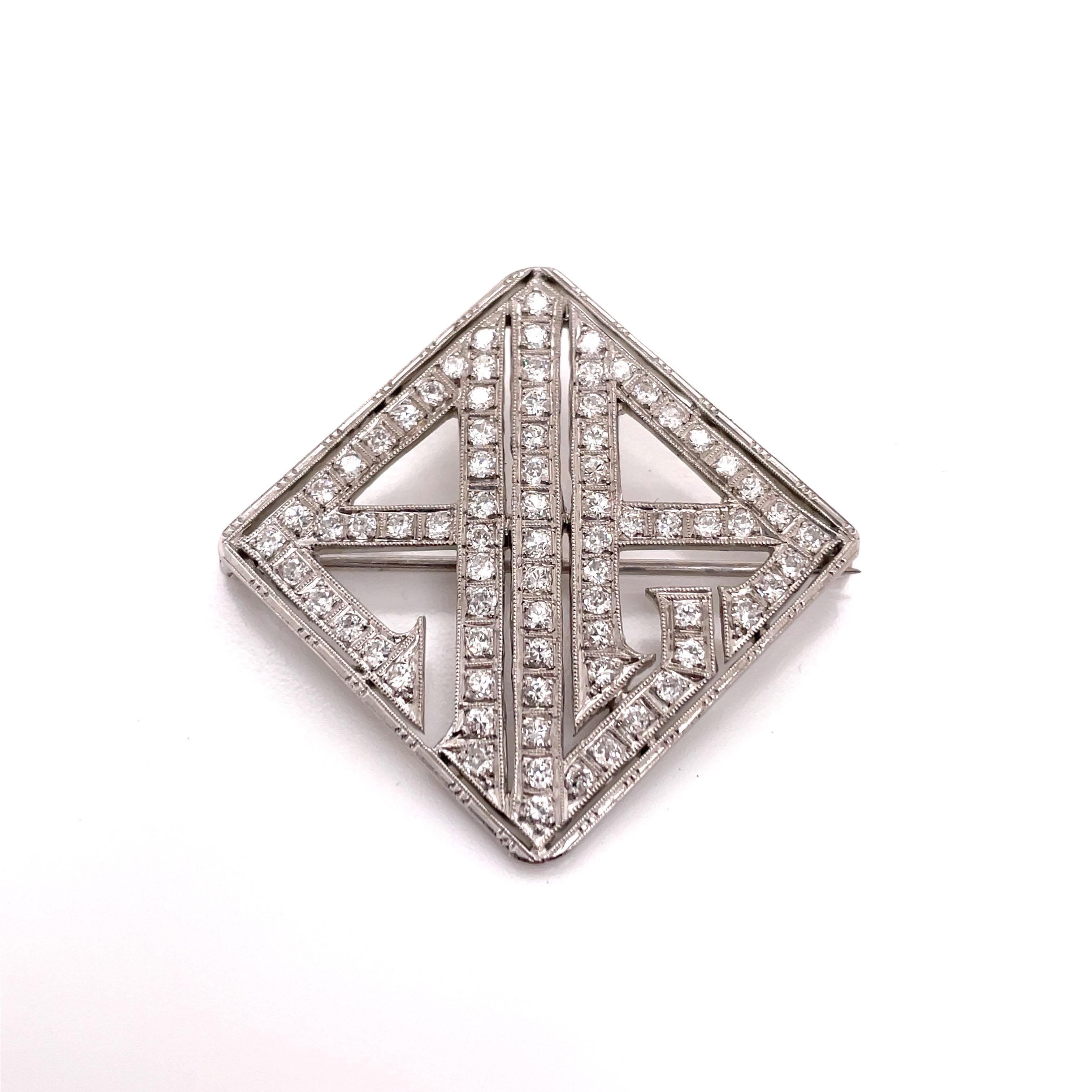 Platinum Art Deco Diamond Monogram A.L.A. Brooch - The brooch is set with 77 round full cut diamonds that weigh approximately 1.50ct total weight. The diamond quality is H - I color and SI1 - I1 clarity. The brooch measures 1.75