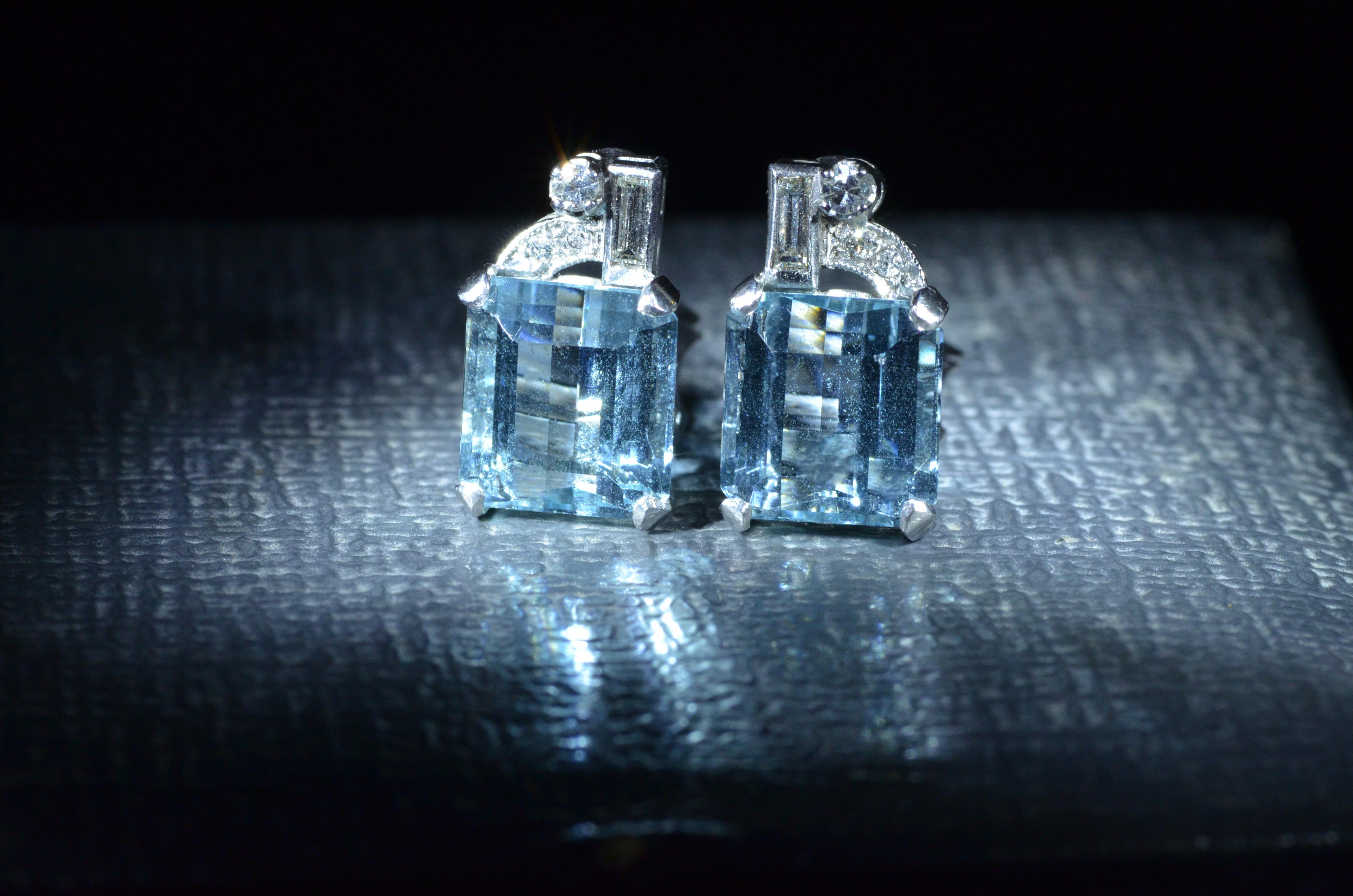 Ladies Platinum Art Deco earrings four (4) prong set with 10 carats of Aquamarine Beryl (5 carats each ear).  The earrings are also set with baguette cut and single cut diamonds for a total diamond weight by measurement of 0.30 carats.  The earrings