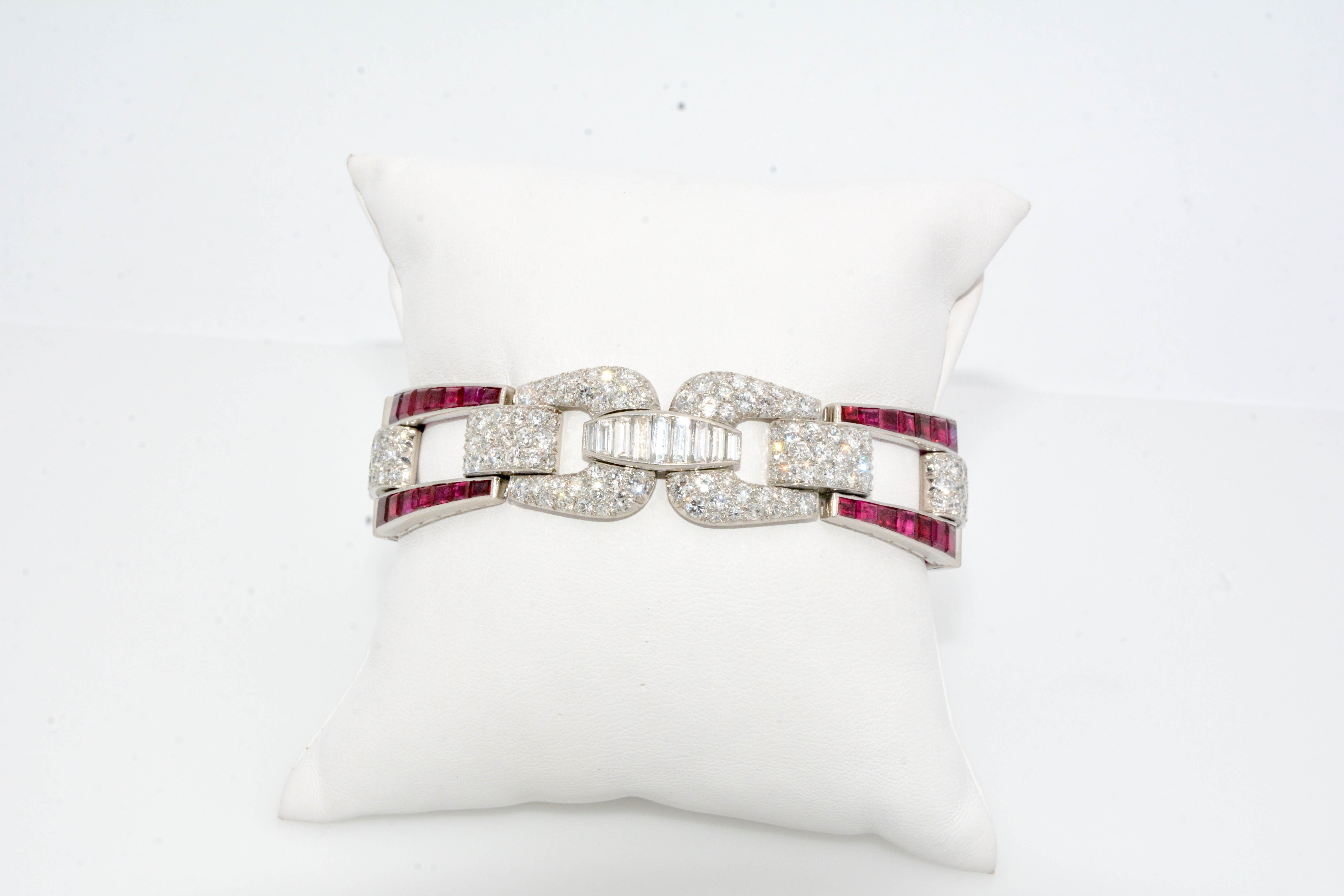 Wrap her wrist in scintillating style with this chic Art Deco inspired link bracelet. Crafted in Platinum, this sleek and sophisticated bracelet showcases four links set with calibre Burma rubies (no heat treatment) and ten links of round brilliant