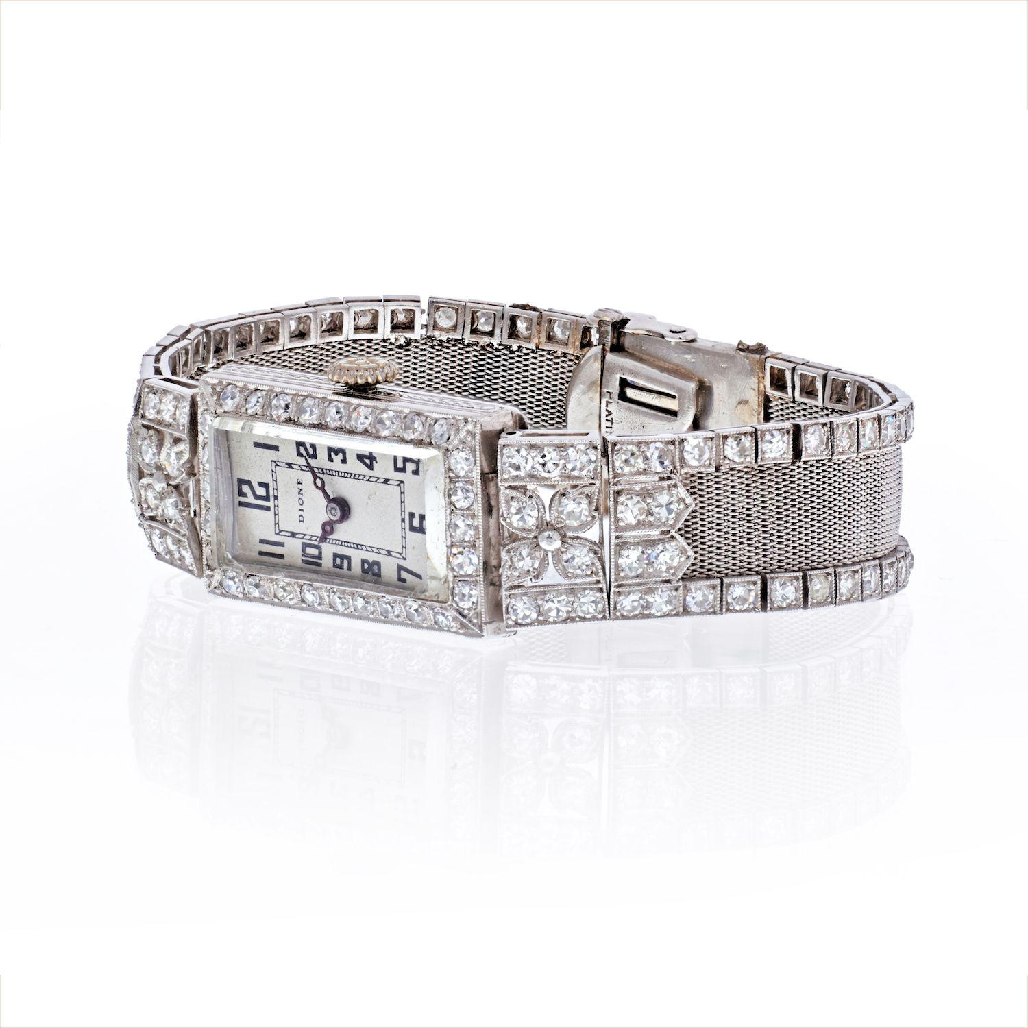 2.60cts Art Deco Platinum and Diamond Mesh Wristwatch. 
Centering a rectangular dial framed and flanked by single cut diamonds, and the mesh strap edged by a continuous line of single cut diamonds approximately 2.70 cts., Swiss movement, circa 1920.