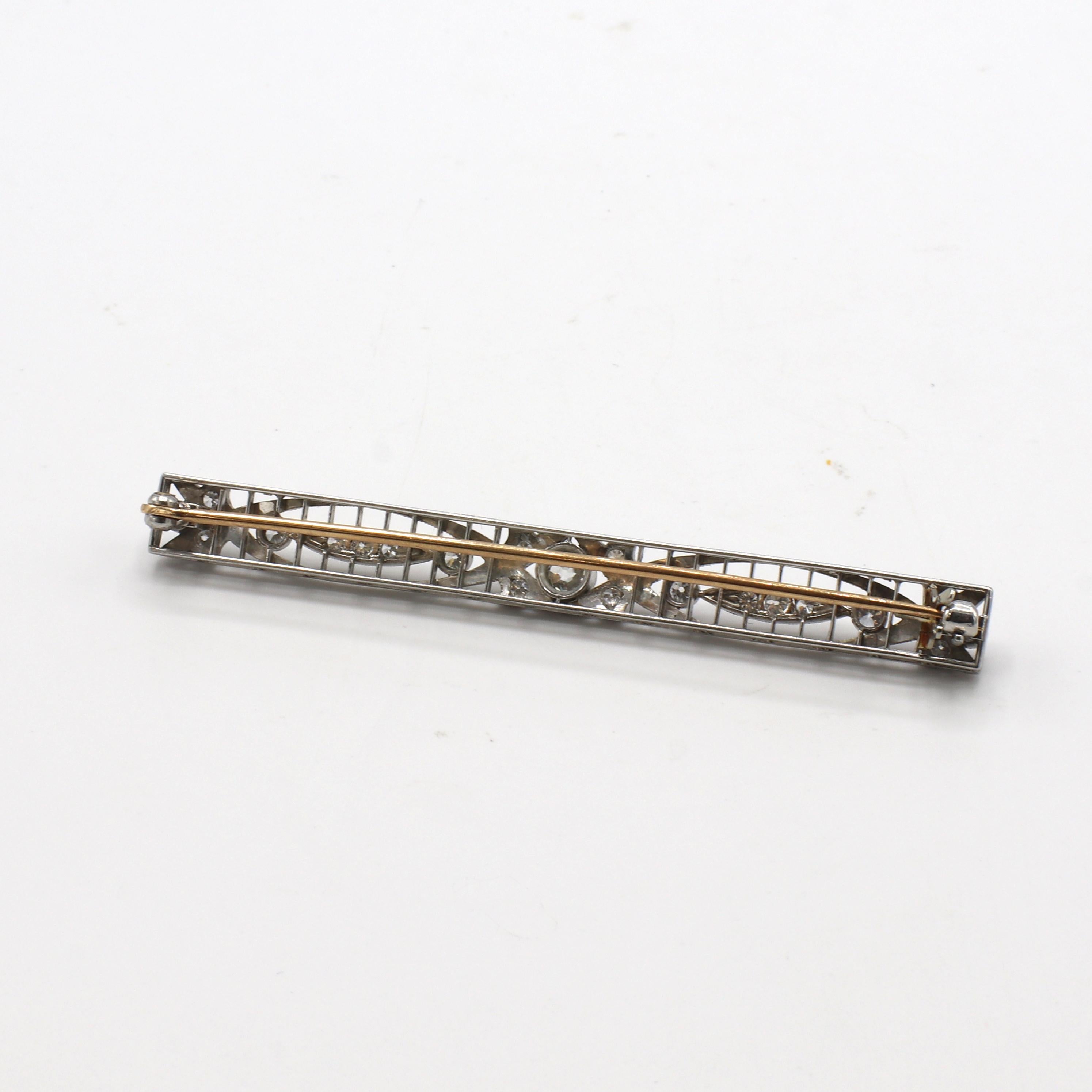 Platinum Art Deco Old European Cut Natural Diamond Bar Pin Brooch Pin
Metal: Platinum & 14k gold
Weight: 9.3 grams
Diamonds: Approx. .85 CTW European cut H-I VS natural diamonds
Length: 70mm
Width: 6.8mm
