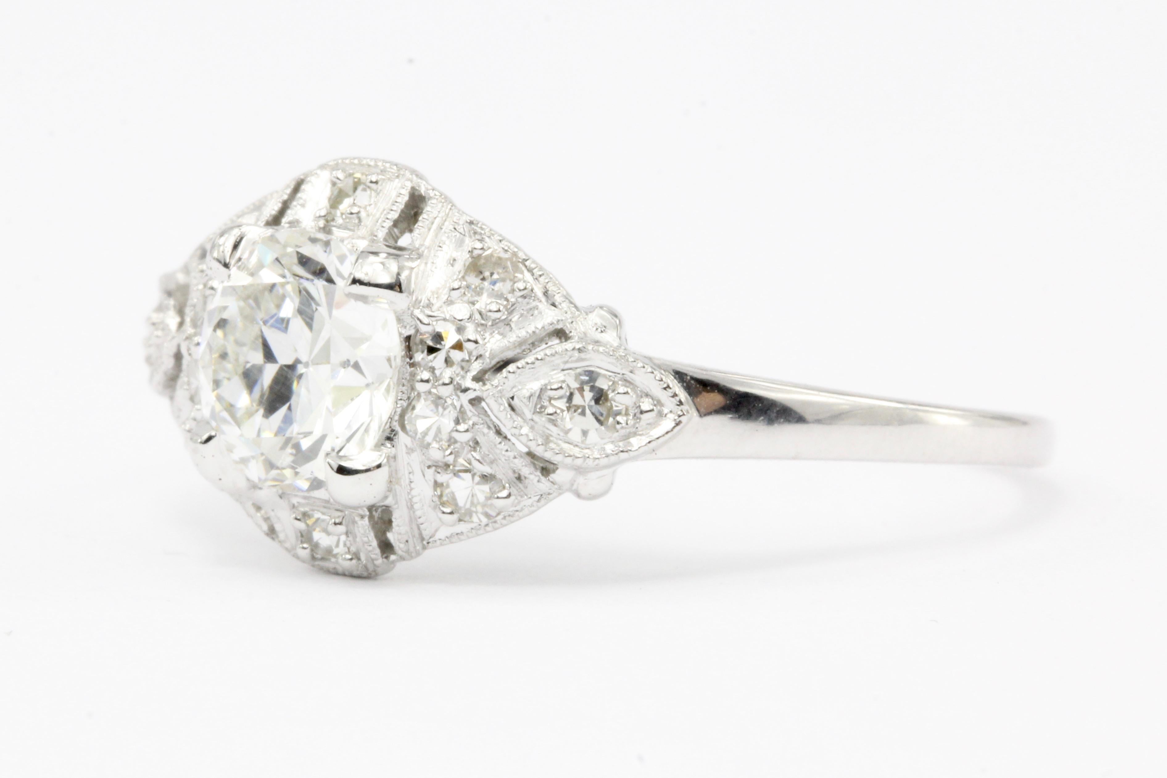 Era: Art Deco c.1920's

Composition: Platinum

Primary Stone: Old European Cut Diamond

Stone Carat: Approximately .75 carats

Color / Clarity: I - VS2

Accent Stone: Single Cut Diamonds

Color/Clarity: VS1/2 - G/H

Total Diamond Weight:
