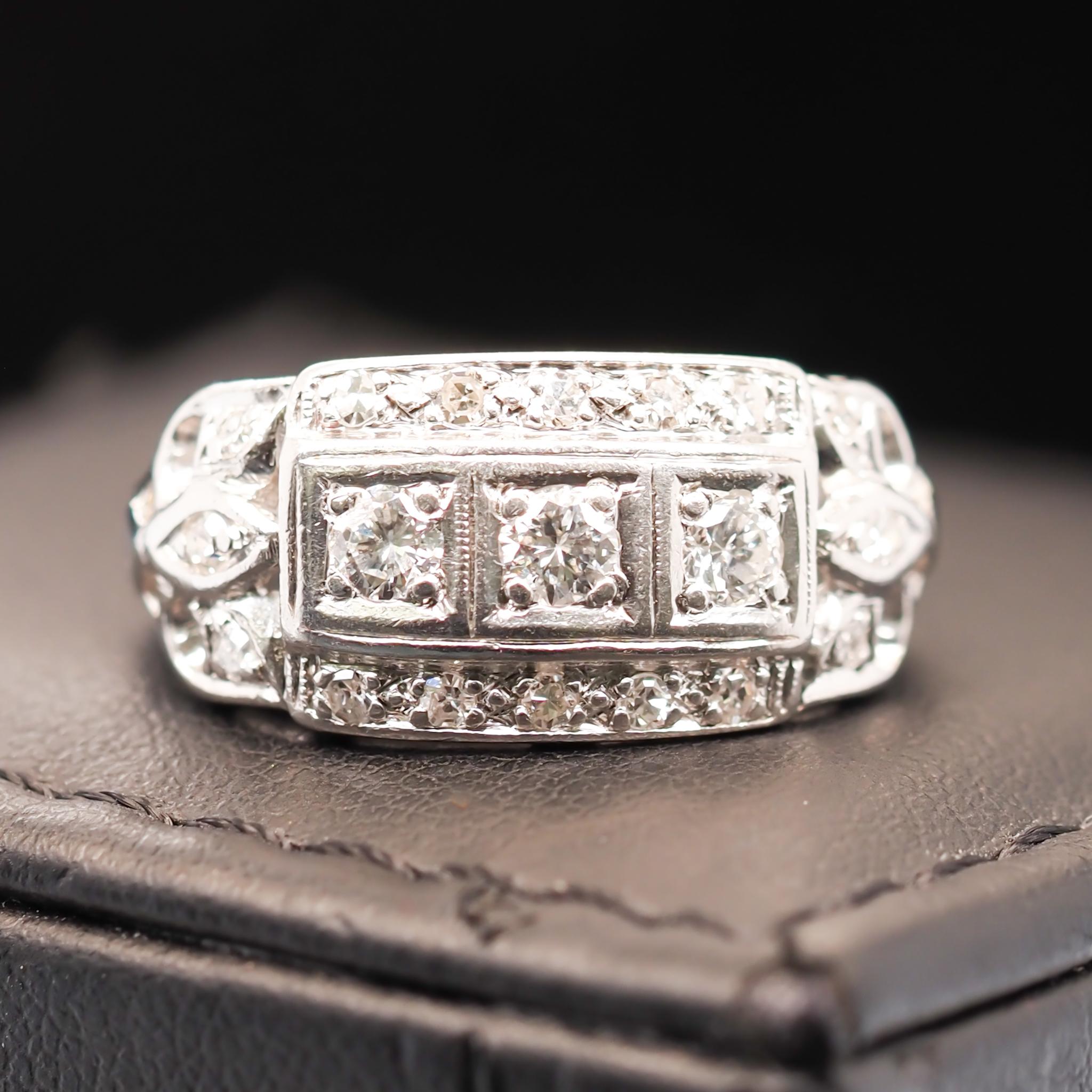 Year: 1940s

Item Details:
Ring Size: 7.75
Metal Type: Platinum [Hallmarked, and Tested]
Weight: 6.6 grams

Diamond Details: .50ct, total weight. G-H Color, VS Clarity, Old European Transitional Cut, natural diamond.

Band Width: 2.50 mm
Condition: