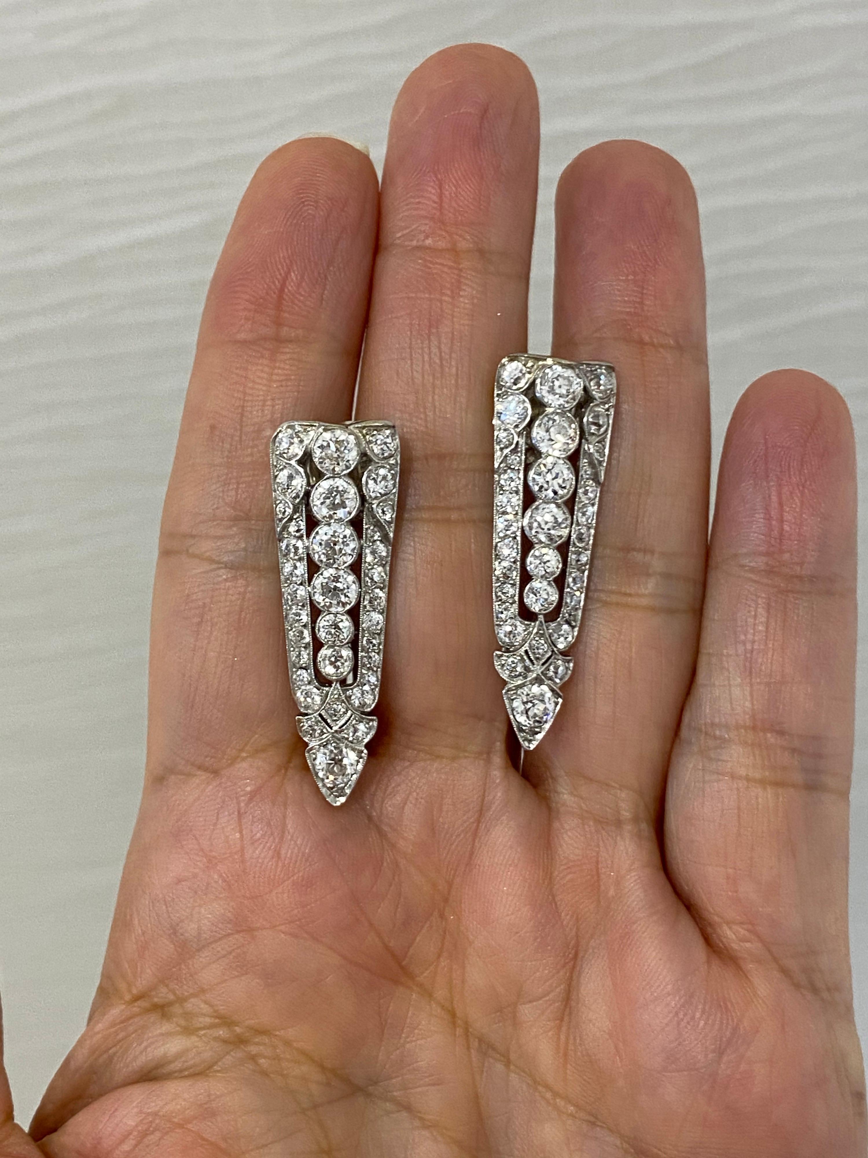 Original Art Deco spear settings. Once Art Deco dress pins. 
Now can be worn and adored noticeably on your ears. Wear them day to 
night, one of a kind and so chic! 
68 old European diamonds =Approx 3.40 CTW
F-G color, VS1-SI1
1-3/8 inch long 
Post