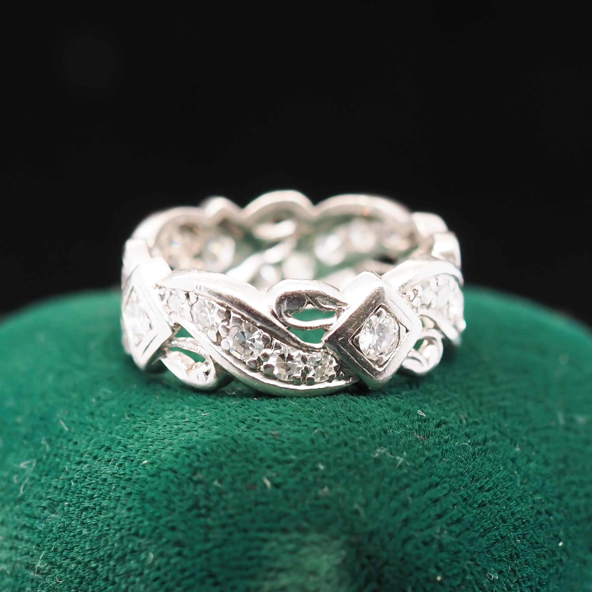 Year: 1940s

Item Details:
Ring Size: 6.25
Metal Type: Platinum [Hallmarked, and Tested]
Weight: 5.7 grams

Diamond Details: .40ct total weight, G-H Color, VS Clarity, Natural Diamonds, Transitional European Cut.

Band Width: 7.3 mm
Condition:
