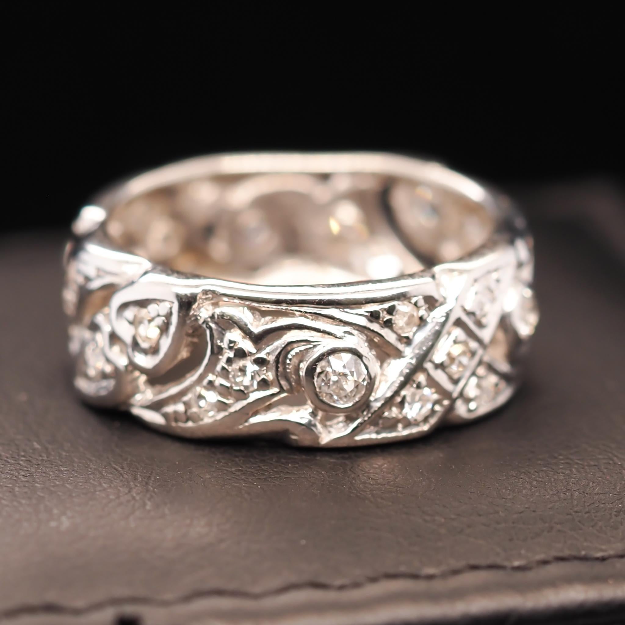 Year: 1940s

Item Details:
Ring Size: 7
Metal Type: Platinum [Hallmarked, and Tested]
Weight: 8.8 grams

Diamond Details: .50ct total weight, G-H Color, SI/I Clarity, Natural Diamonds,European Cut.

Band Width: 7.3 mm
Condition: Excellent
