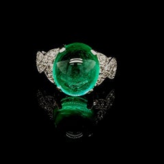 Platinum Art Deco Ring with Colombian Cabochon Emerald and Diamonds