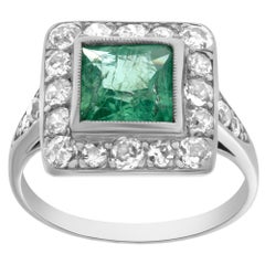Platinum Art Deco Ring with Diamonds and Peridot Stone