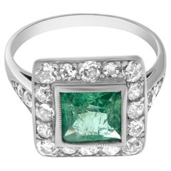 Platinum Art Deco Ring with Diamonds and Peridot Stone
