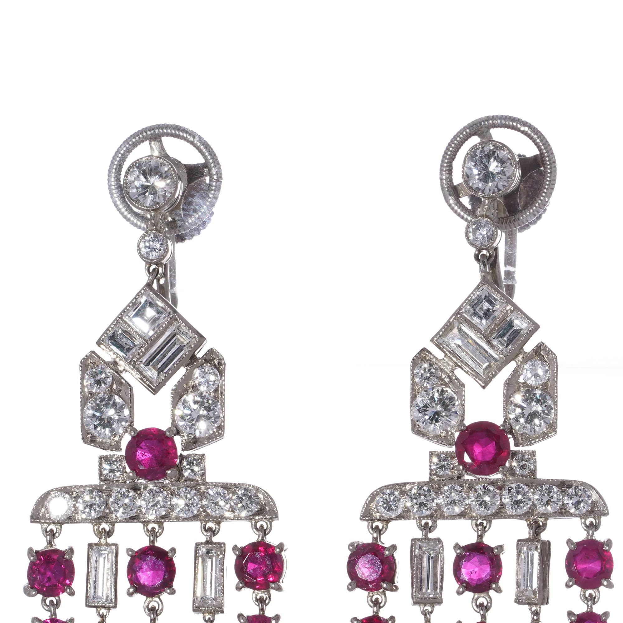 Platinum Art Deco Ruby and Diamond Chandelier Earrings. 

A stunning pair of platinum Art Deco earrings from the 1930s, featuring intricate geometric chandelier designs with rubies and diamonds.

Key Features
Material: Platinum
Era: 1930s, Art