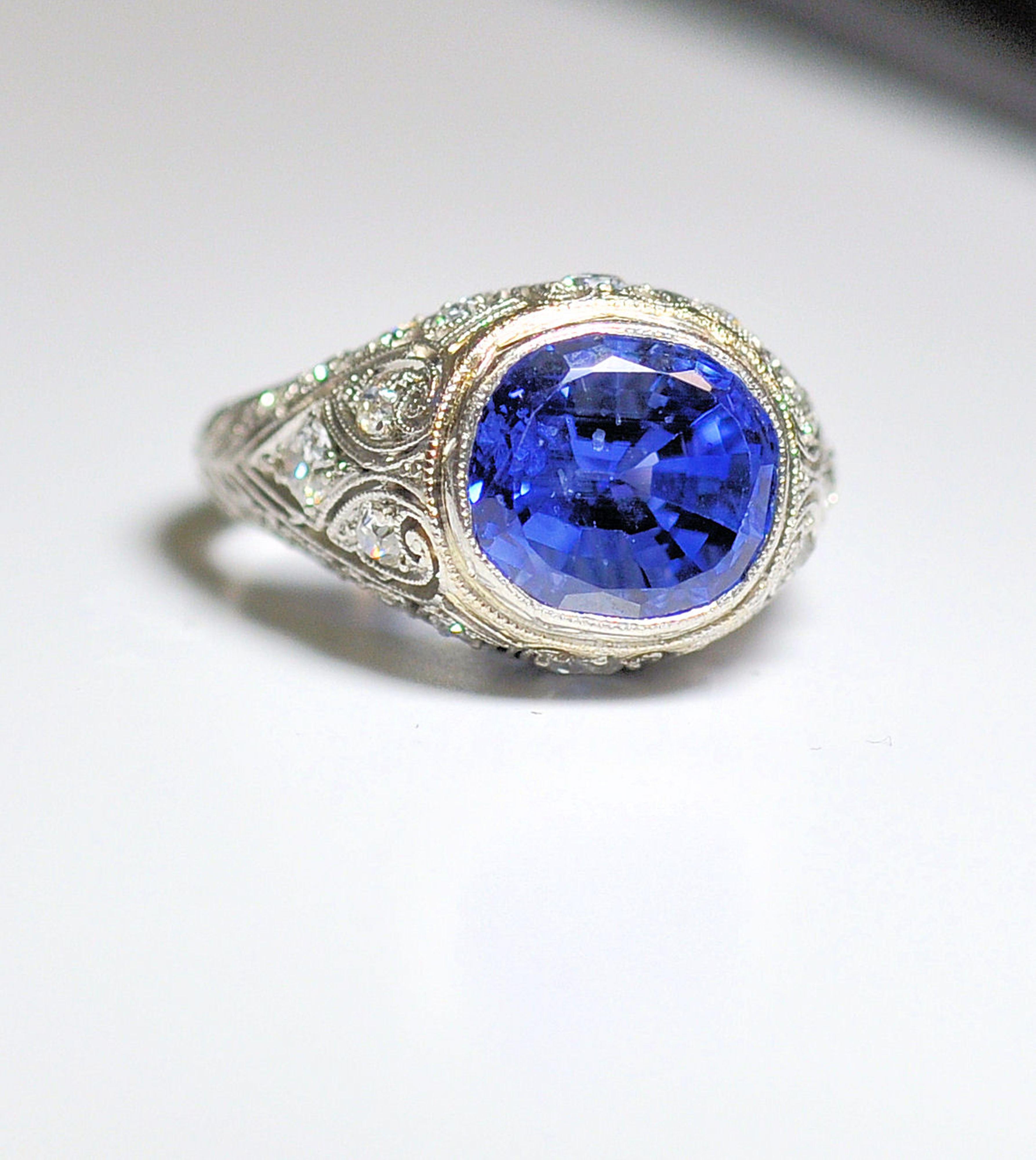Oval Cut Platinum Art Deco Sapphire and Diamond Ring For Sale