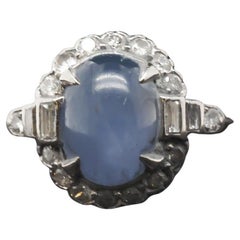 Bague Art déco en platine, saphir étoilé et diamant de Felger and Co.