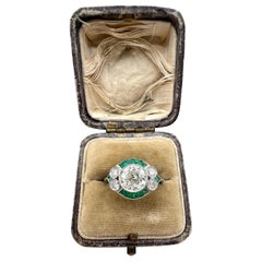 Anello in platino con smeraldo calibrato e diamante in stile Art Déco