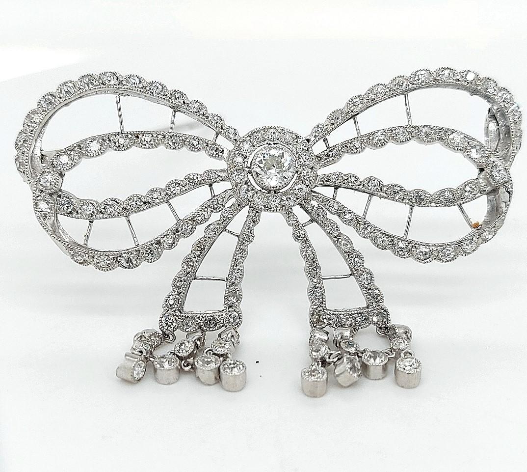 Art Deco Platinum Artdeco Bowknot Diamond Brooch with Dangling Diamonds For Sale