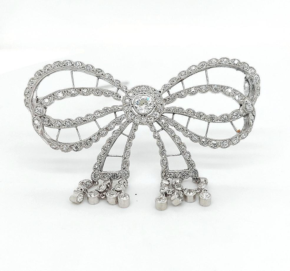 Women's or Men's Platinum Artdeco Bowknot Diamond Brooch with Dangling Diamonds For Sale