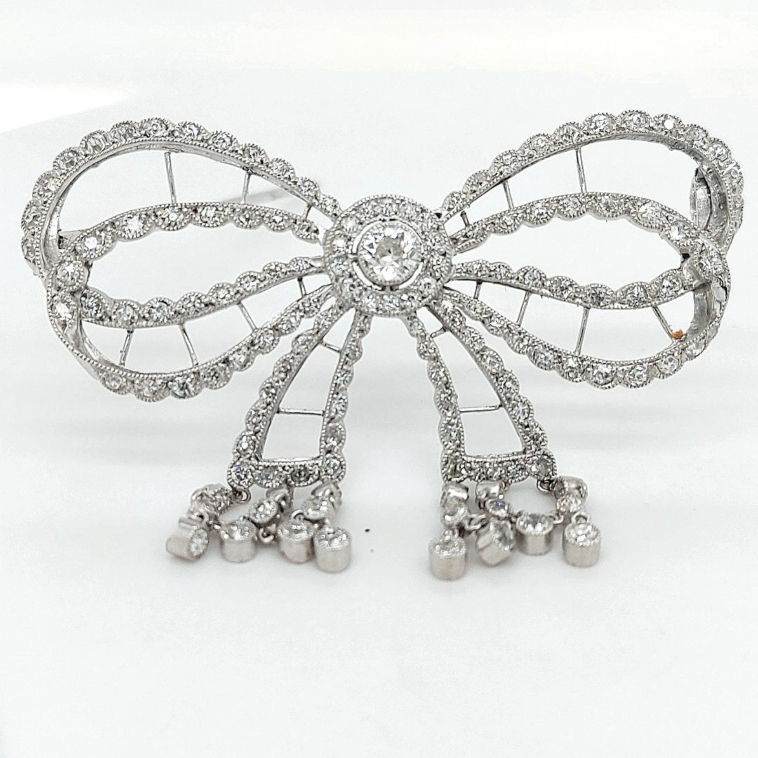 Platinum Artdeco Bowknot Diamond Brooch with Dangling Diamonds For Sale 2