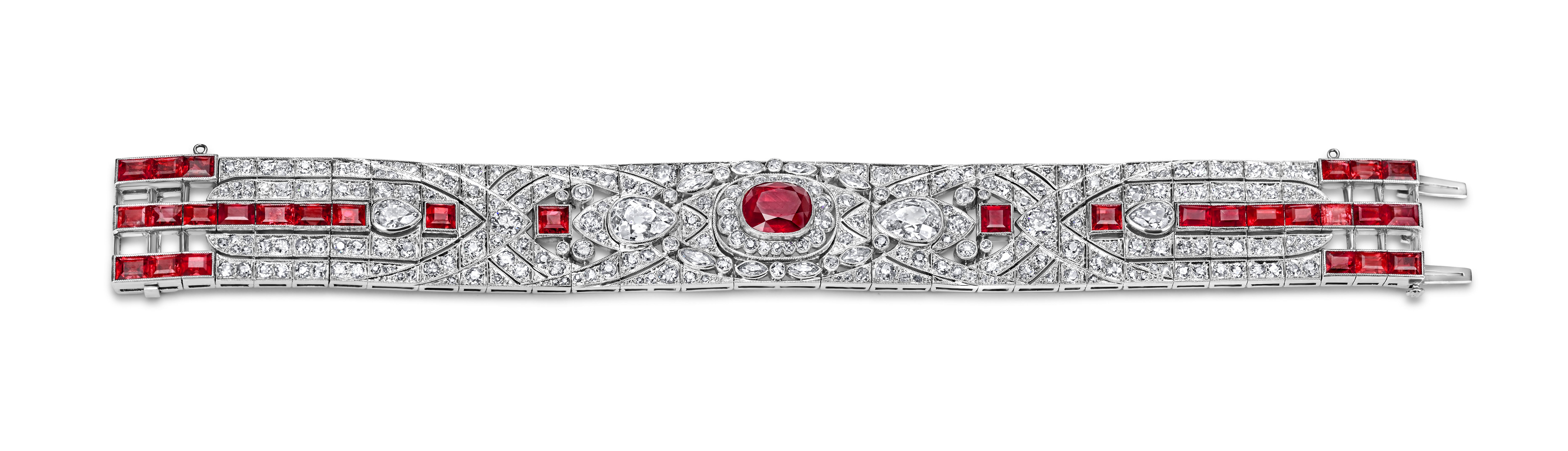 Platinum Artdeco Bracelet  with 9.72ct Rubies and 13.69 ct Diamonds ,Estate to His Majesty Sultan Qaboos Bin Said

Asprey London Box with it,but I couldn t find any hallmarks of Asprey in Bracelet.
All other pieces from Estate are from Asprey London