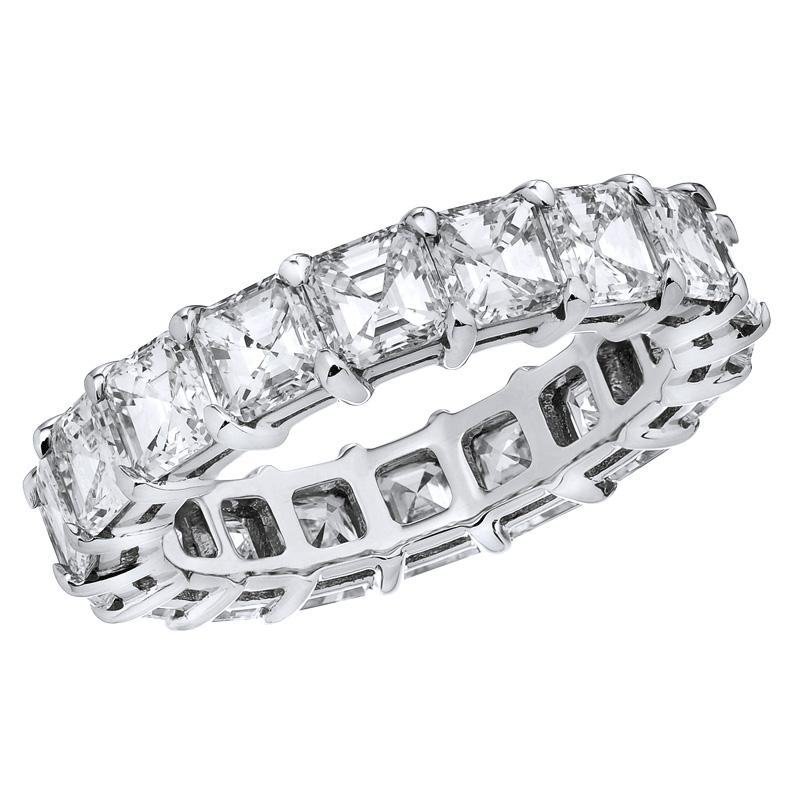 Platinum Asscher Cut Common Prong Eternity Band. This Stunning Wedding Band is Set with 17 Emerald Cut Diamonds Totaling 5.83 Carats. Kindly contact us if you wish to have a custom band made with specific number of diamonds and sizes. All diamonds