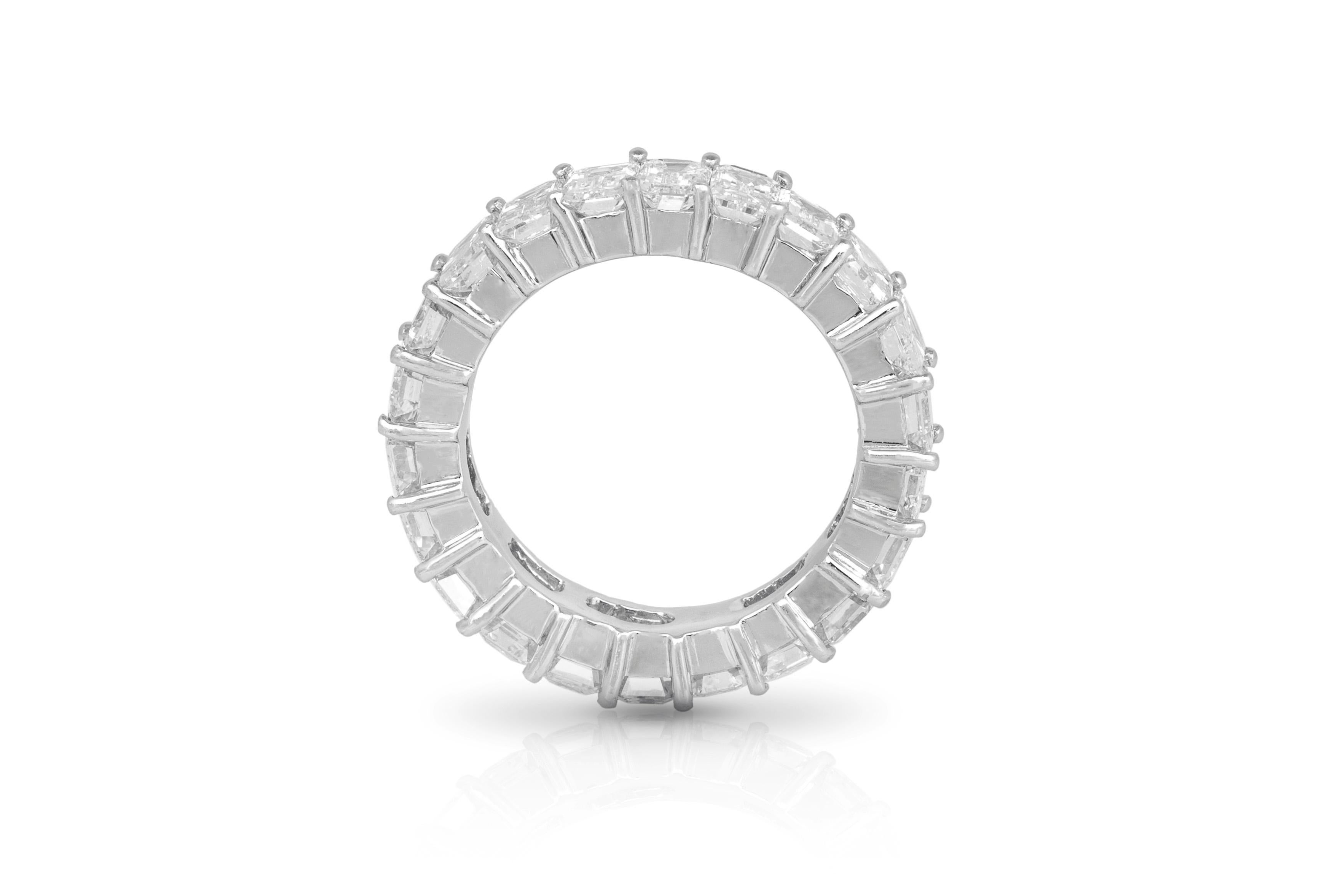 The ring is finely crafted in platinum with diamonds asscher cut weighing approximately total of 7.10 carat.