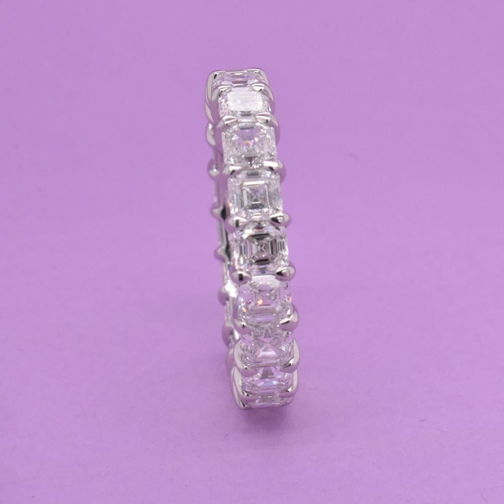 This Platinum ring a is a stunning diamond eternity band. 
The ring has 20 Asscher diamonds. The Diamonds are 4.35 total carat. The ring diamonds are F-G / VS. The ring is a size 6.25 but can be made for order in any size.
Message us out with any