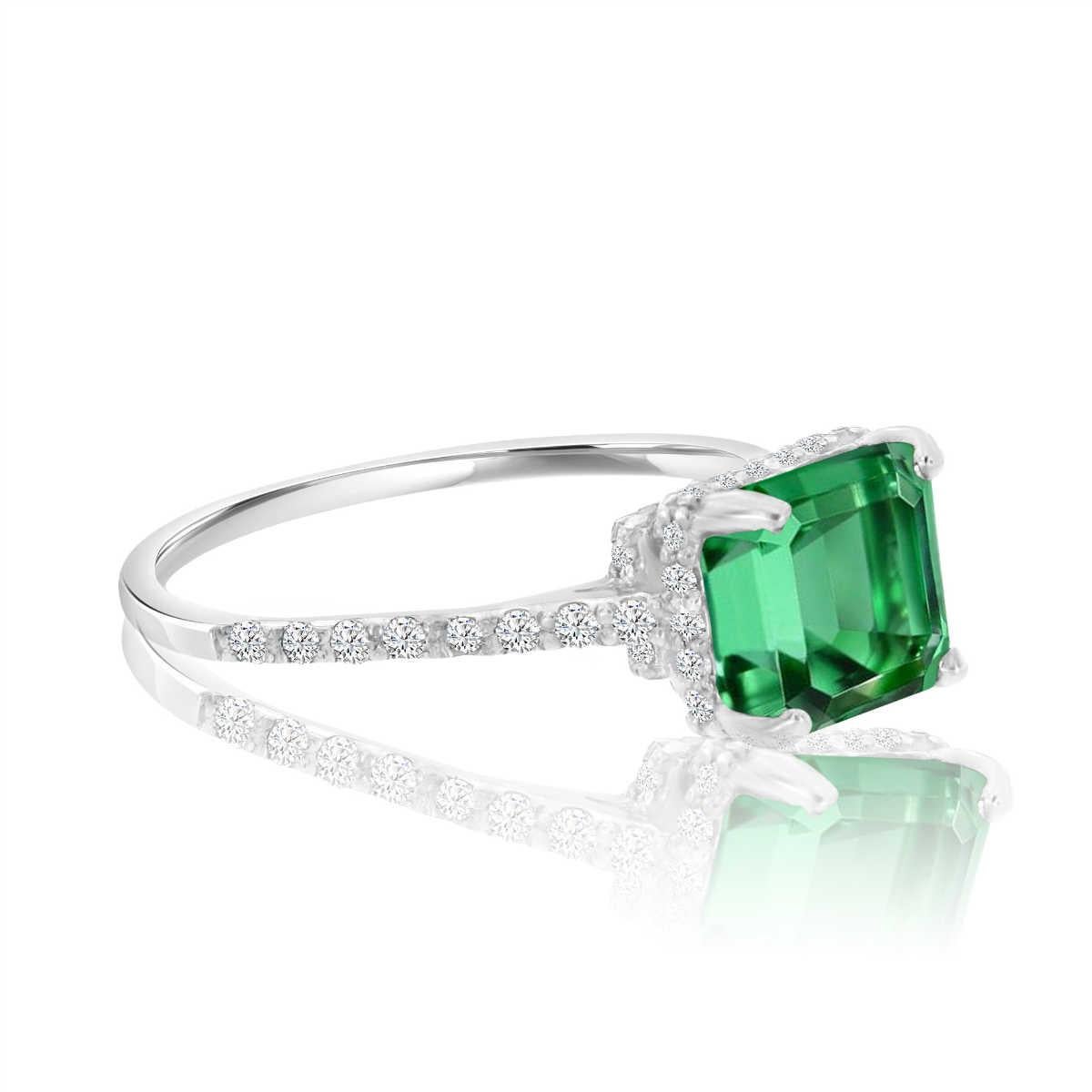 This Pre-Owned delicate platinum ring features a 1.78 Assher cut green emerald set in a four-prong basket crown. The designer set petite round melee diamonds on the crown's double gallery. An additional one row of diamond micro-prong set from each