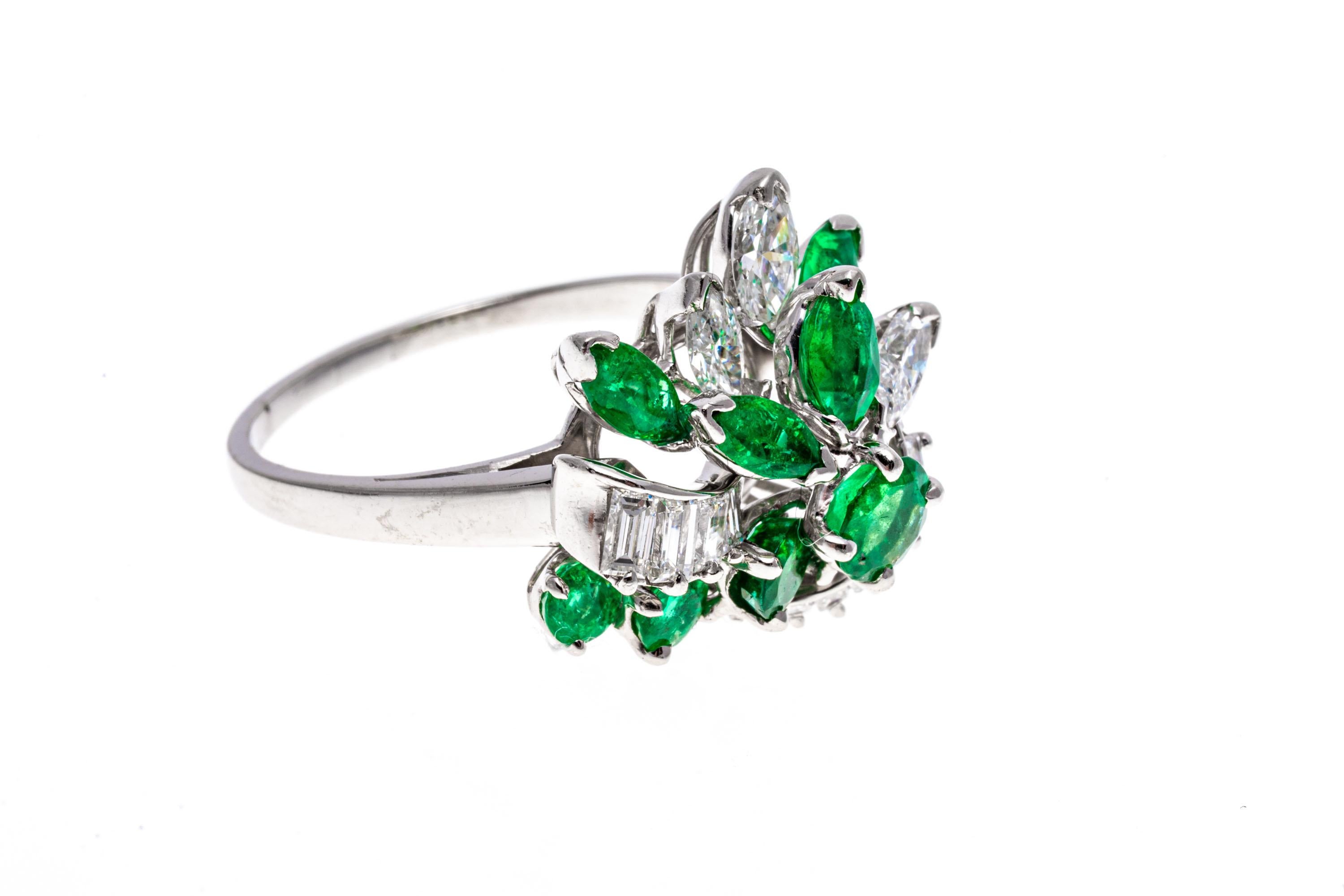 Platinum ring. This gorgeous ring is a brilliant cluster, consisting of marquise faceted diamonds (approximately 0.42 TCW) and marquise faceted, bright green emeralds (approximately 0.40 TCW), all prong set, set among a ribbon of graduated, round