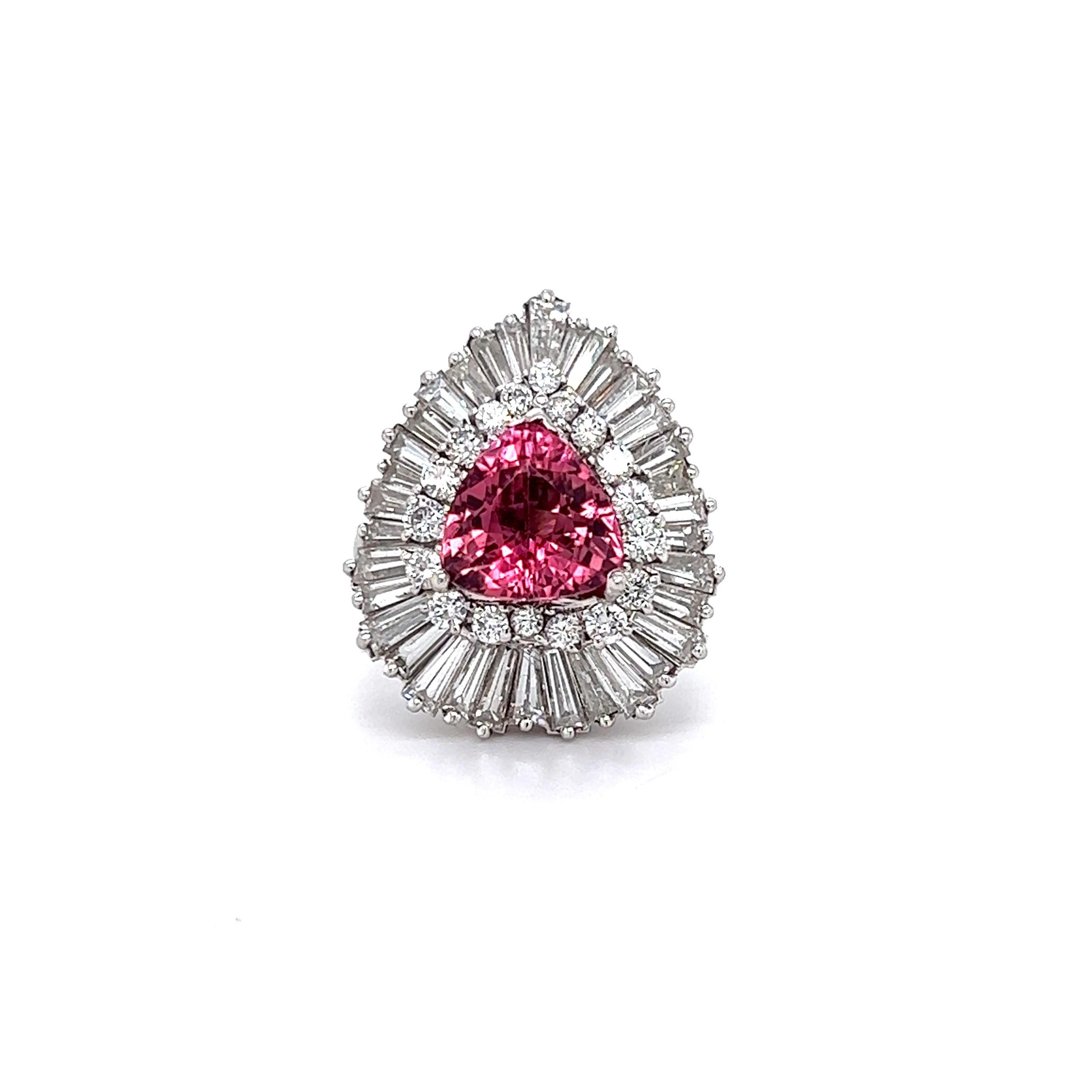 Platinum Baguette and Round Diamonds Trillion Cut Rubellite Ballerina Ring

A unique ring with tapered cut baguettes and round diamonds surrounding the center Rubellite

Apprx. 5.50ct. G color VS Clarity diamonds total weight.

3.05ct. Trillion cut