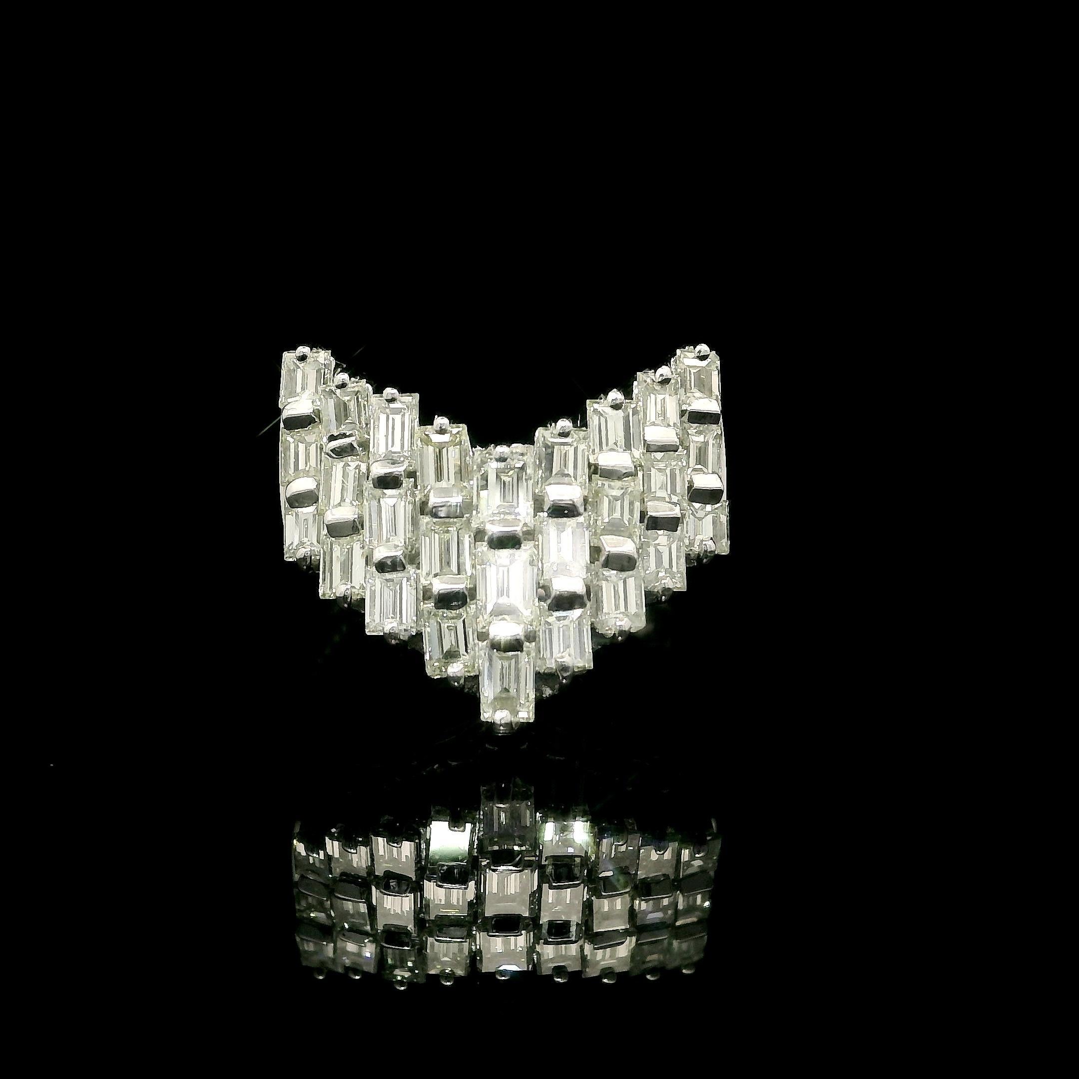 -Piedra(s): -
(27) Diamantes auténticos naturales - talla baguette recta - engastados en barra/canal - color I/J - claridad VS1-VS2 - 1,50ctw (aprox.)

Material: Platino macizo 
Peso total:  7,39 gramos
Anchura total: 14,84 mm (0,58