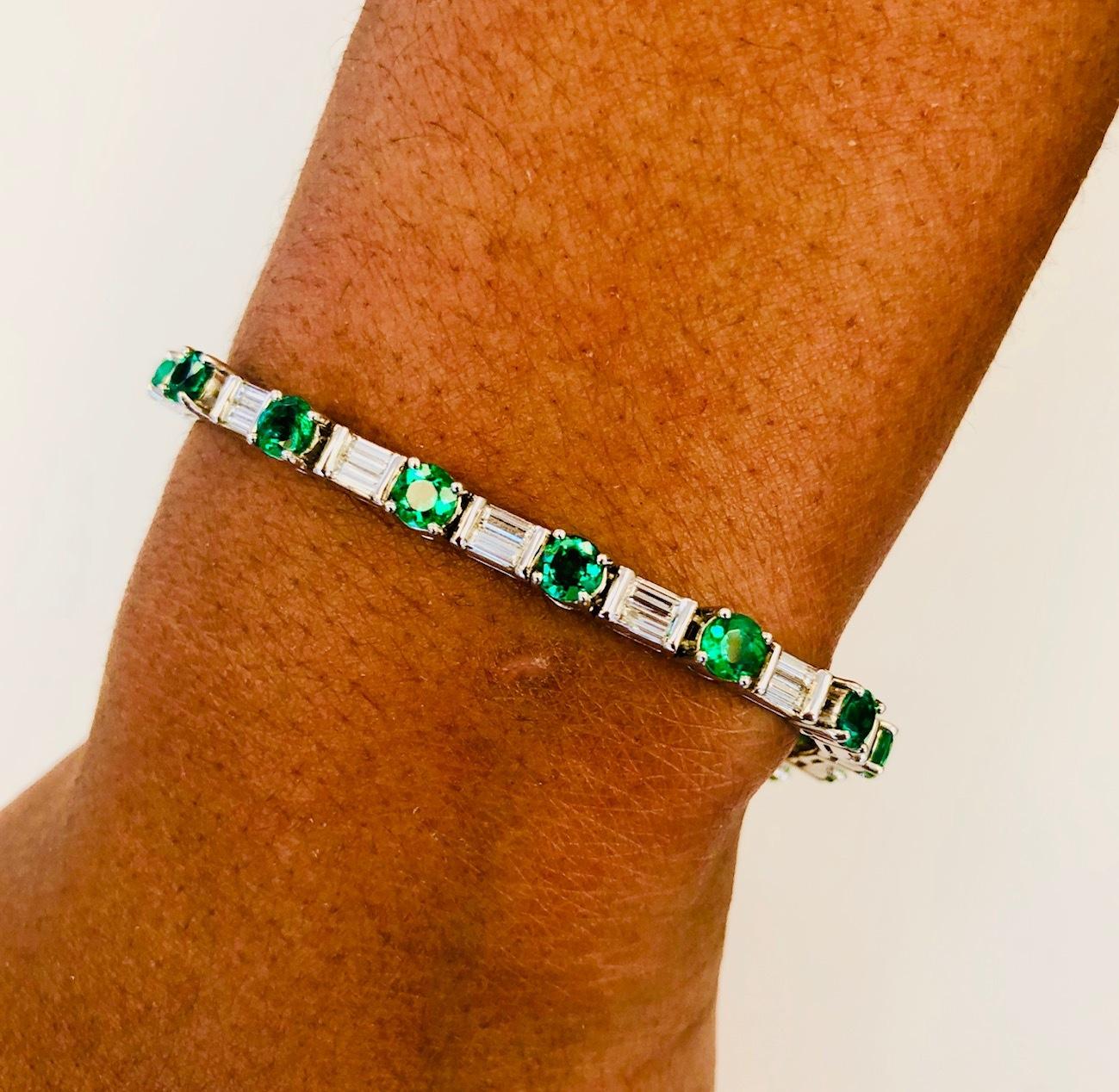 Fine quality line Bracelet made in Platinum, set with 34 Extra Fine Emeralds 4.62 carats and 34 fine Baguette Diamonds 2.81 carats. The beauty of this Bracelets is the high quality and perfect matching of the Emeralds.
Also available set with All