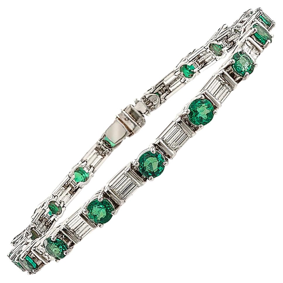 Platinum Baguette Diamond and Fine Emerald Line Bracelet For Sale