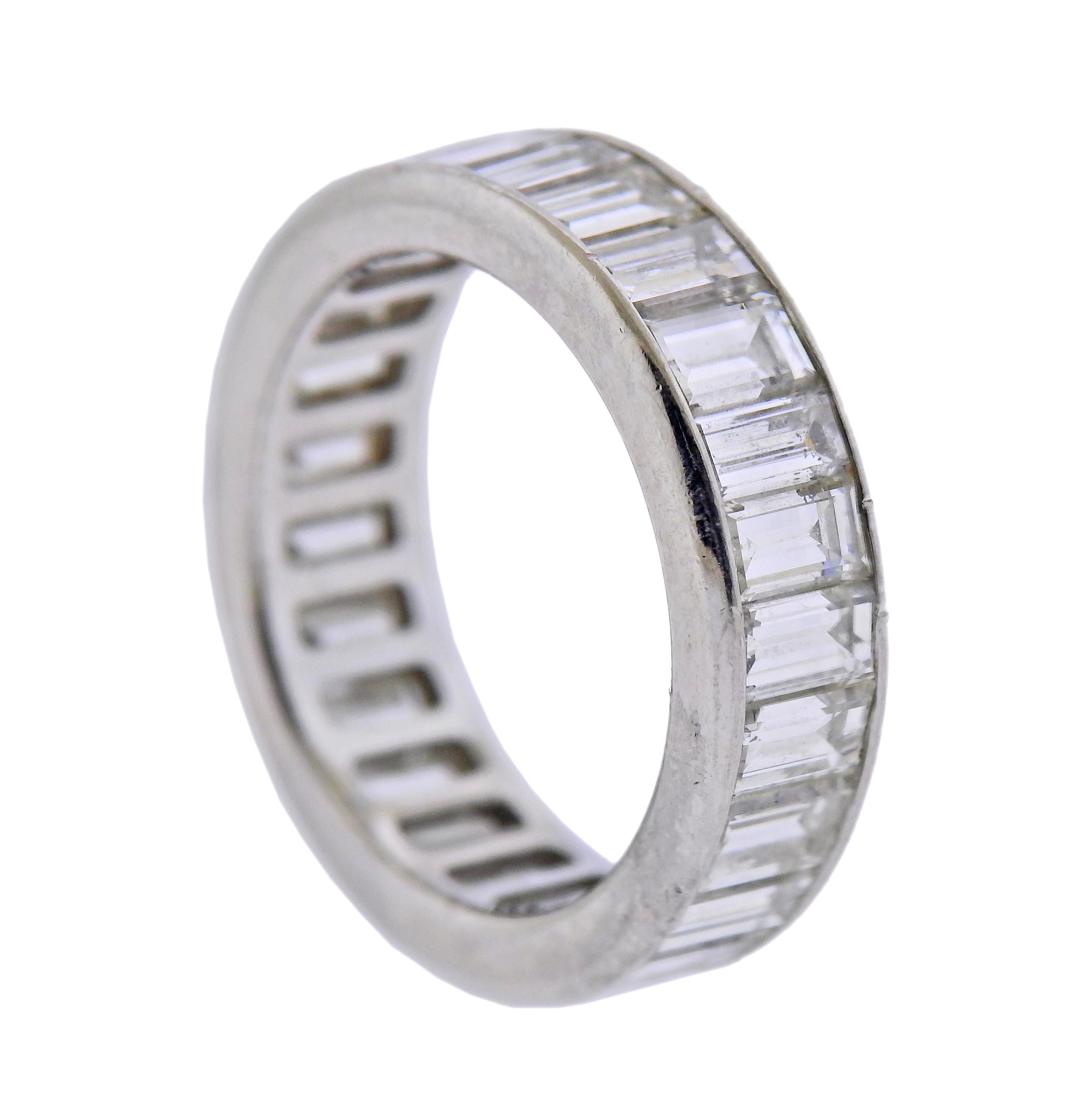 Platinum eternity wedding band ring, with 25 baguette diamonds - approx. 3.75cts. Ring size - 6.5, ring is 6mm wide. Weight - 7 grams.