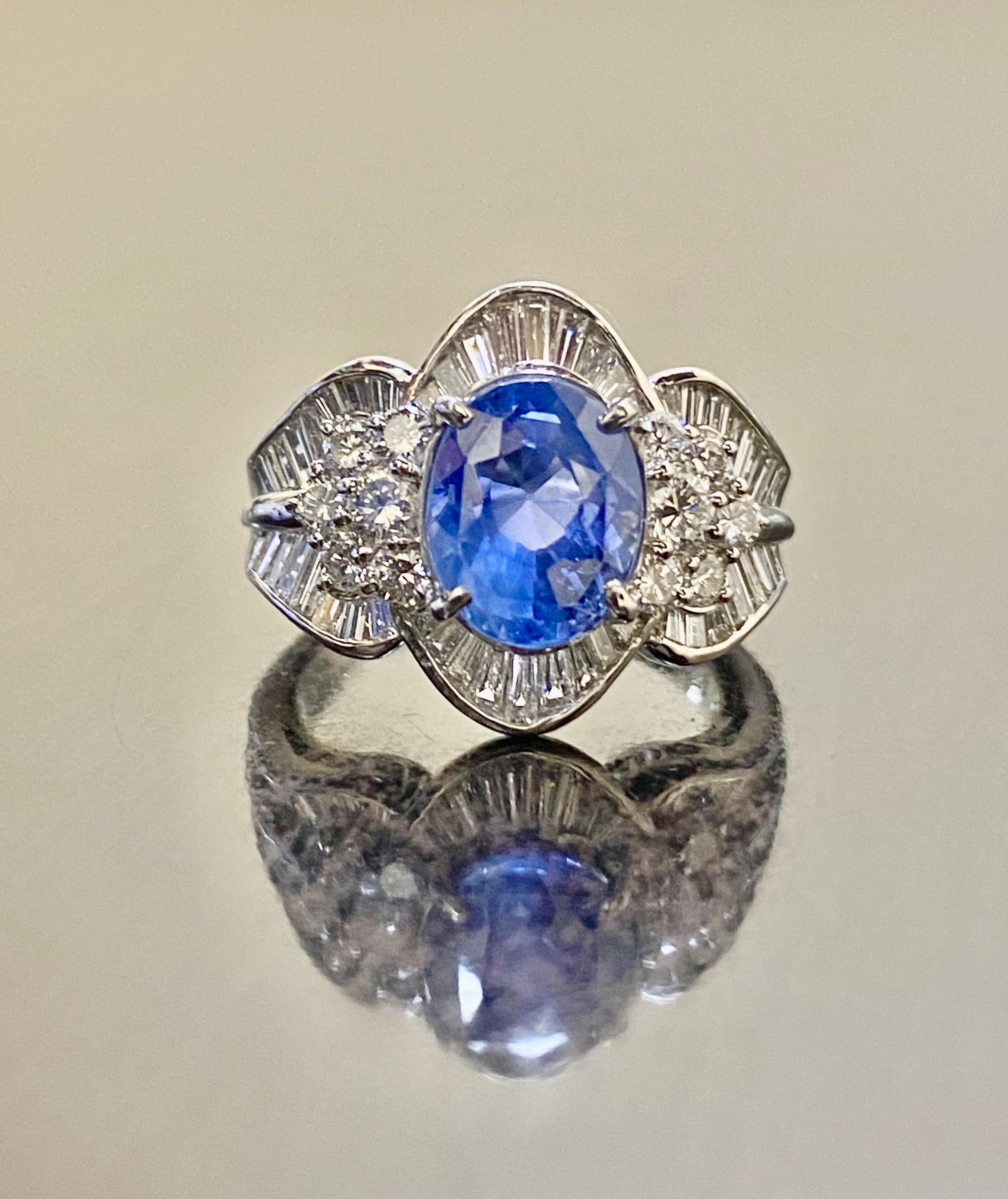 Art Deco Platinum Baguette Diamond GIA Certified Oval 4.05 No Heat Blue Sapphire Ring For Sale