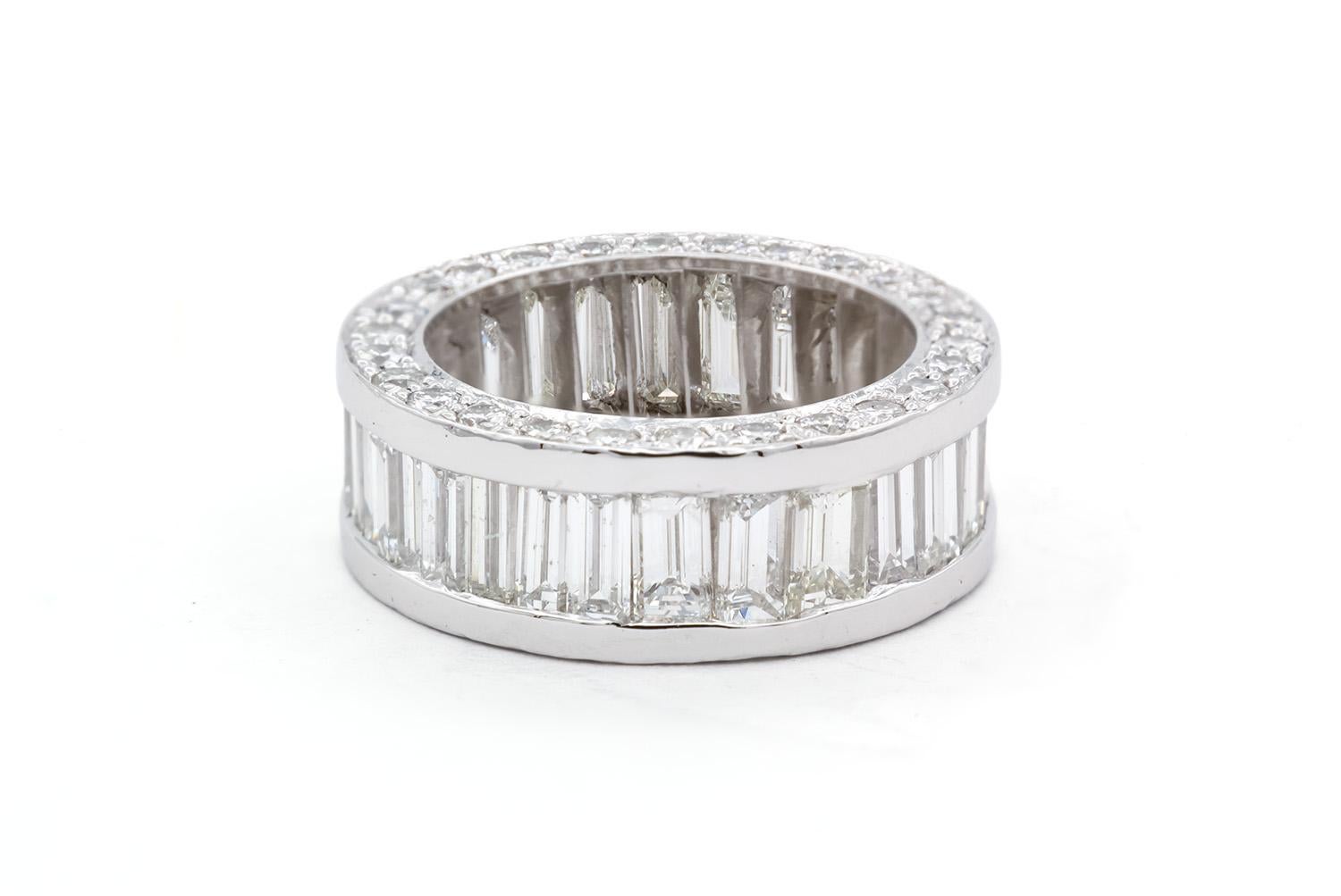 We are pleased to offer this Platinum Baguette & Round Brilliant Diamond Eternity Wedding Band. This beautiful band features an eternity style with an estimated 6.00ctw G-I/VS-SI baguette & round brilliant cut diamonds all set in a stunning platinum