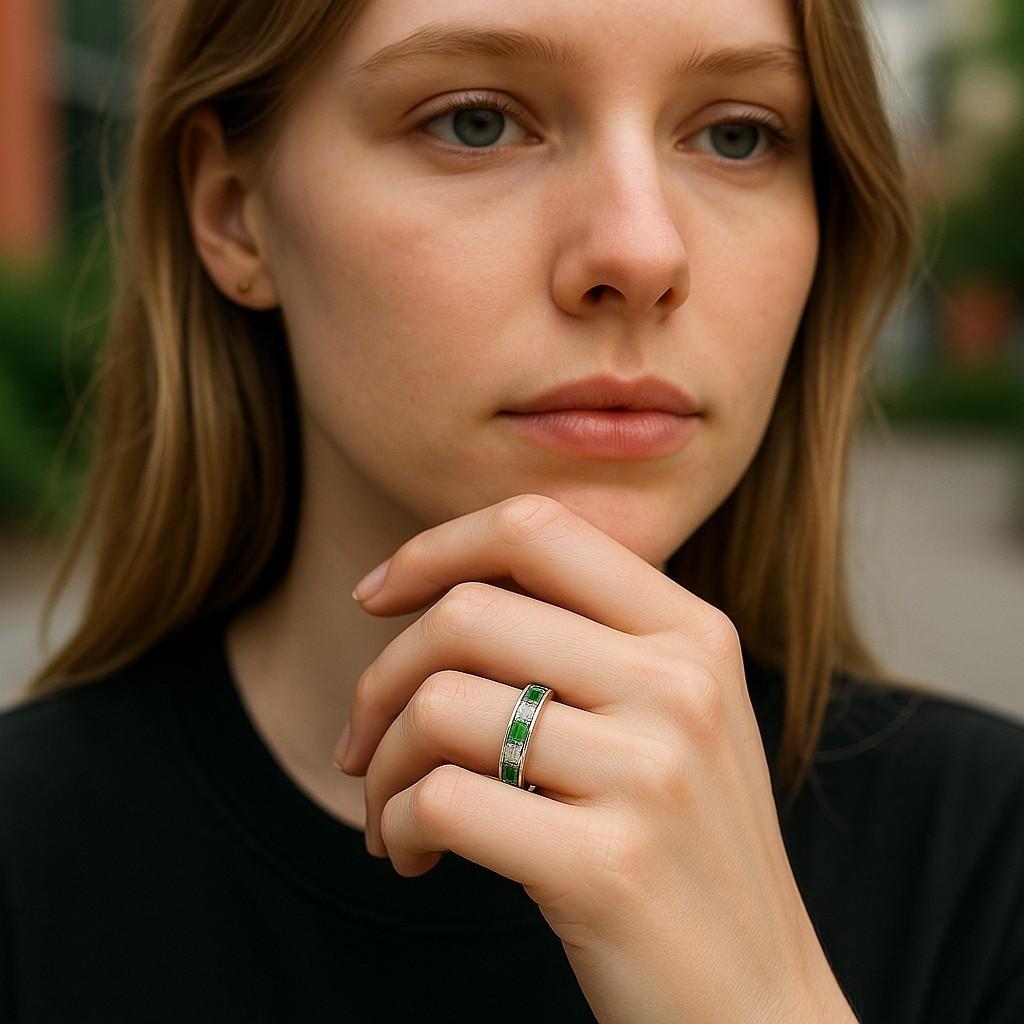 Introducing our exquisite Platinum Baguette-Shaped Diamond and Emerald Channel Set Eternity Ring, a timeless symbol of eternal love and commitment. This stunning piece is meticulously crafted to perfection, showcasing the harmonious blend of