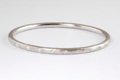 Bracciale in platino con diamanti a forma di pera e taglio brillante rotondo