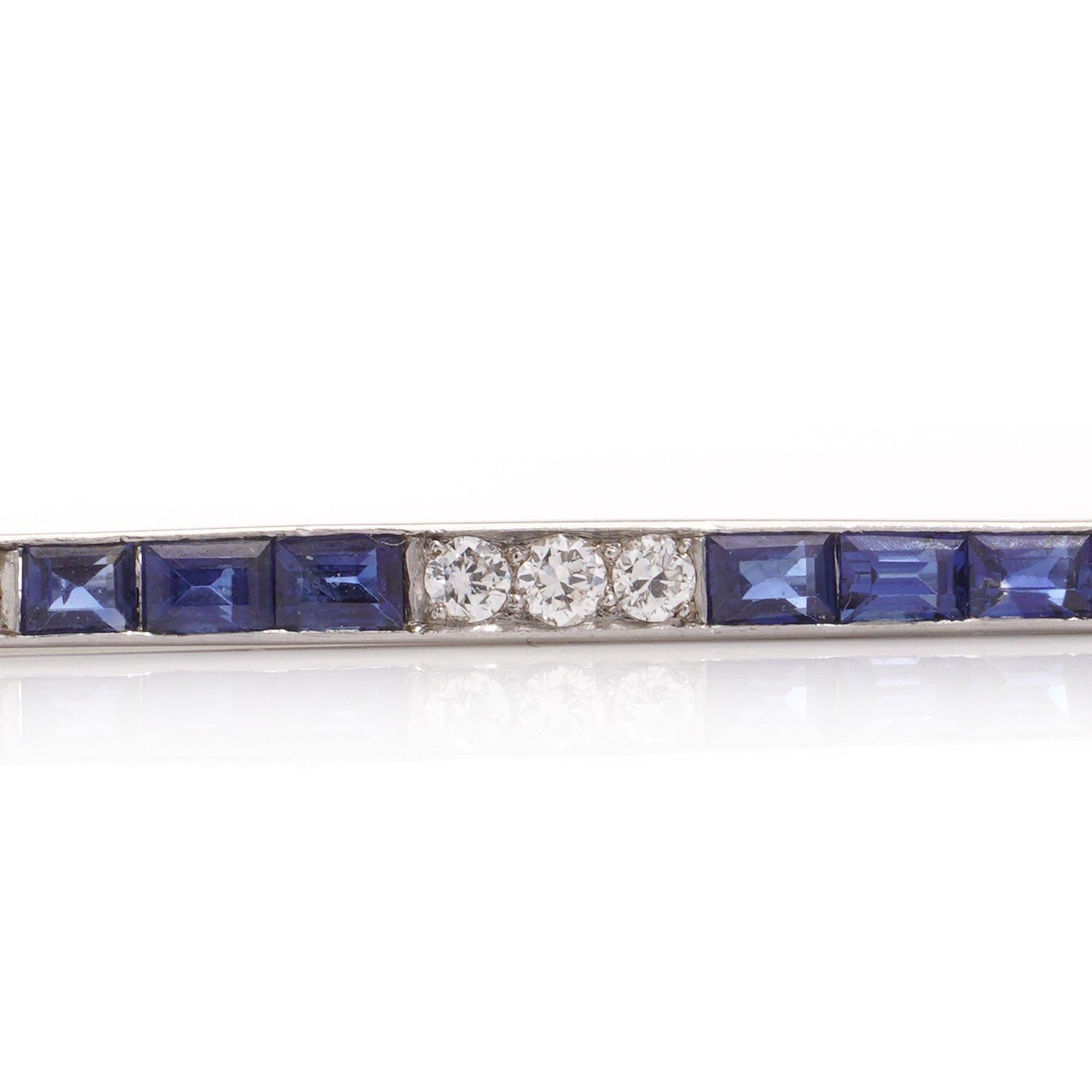 Brilliant Cut Platinum bar brooch set with sapphires and diamonds  For Sale